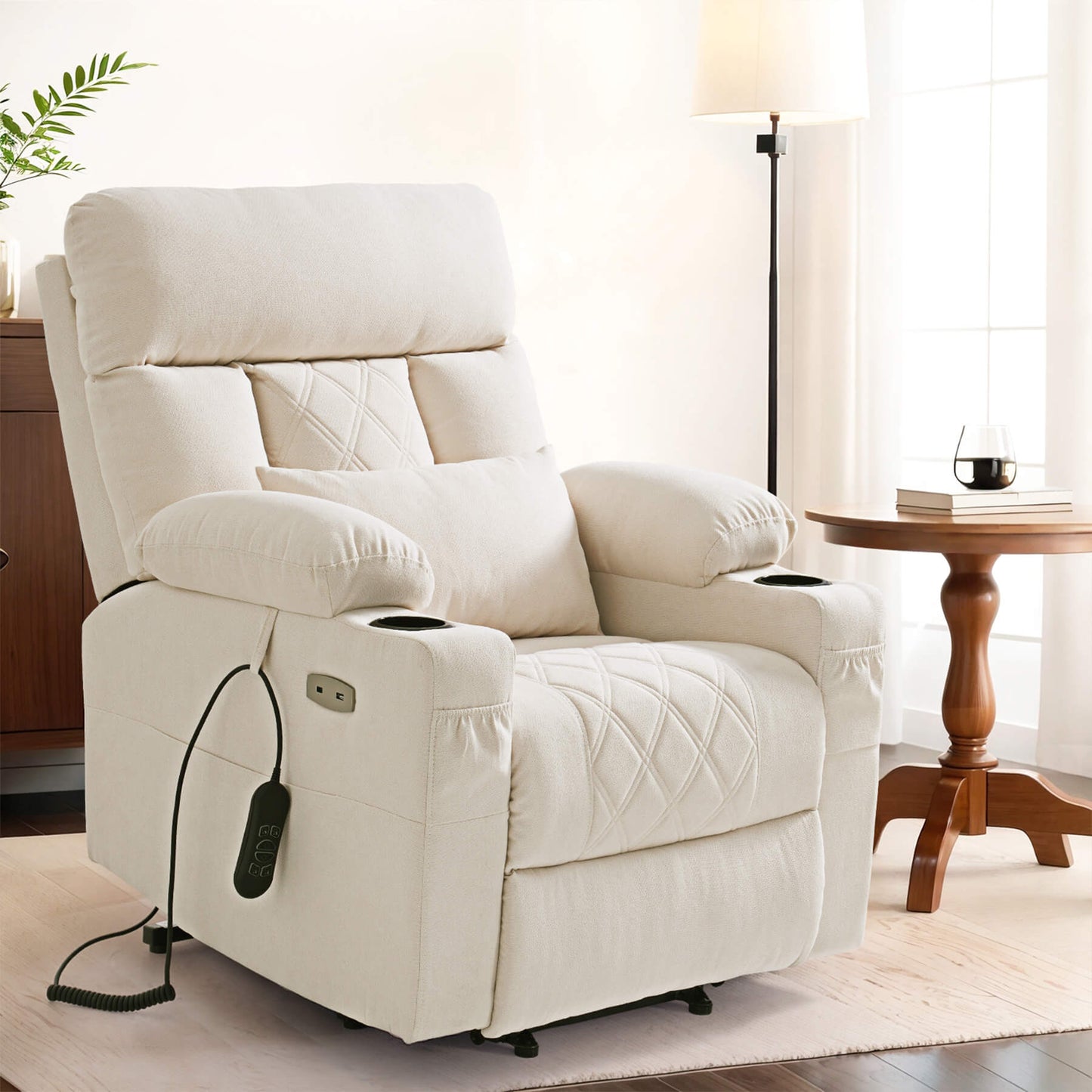Sitting position beige fabric power recliner with a lumbar pillow and two cup holders
