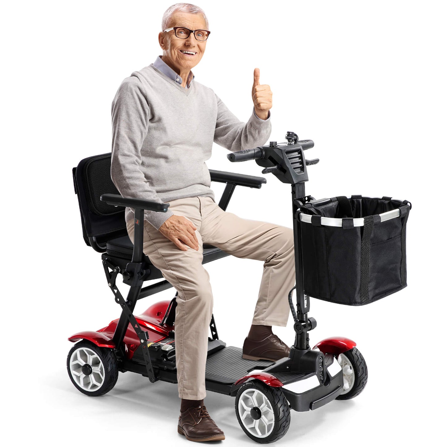 An elderly man is resting on his mobility scooter, and he's very happy with it.