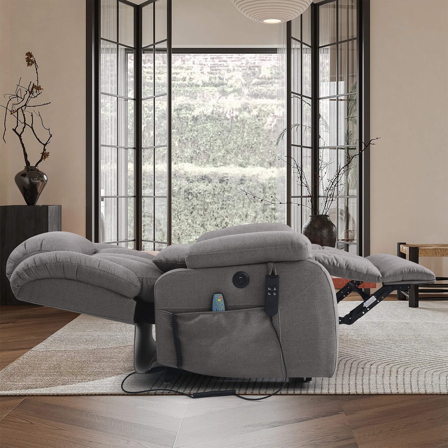 The gray lay flat recliner chair, perfect for sleeping.