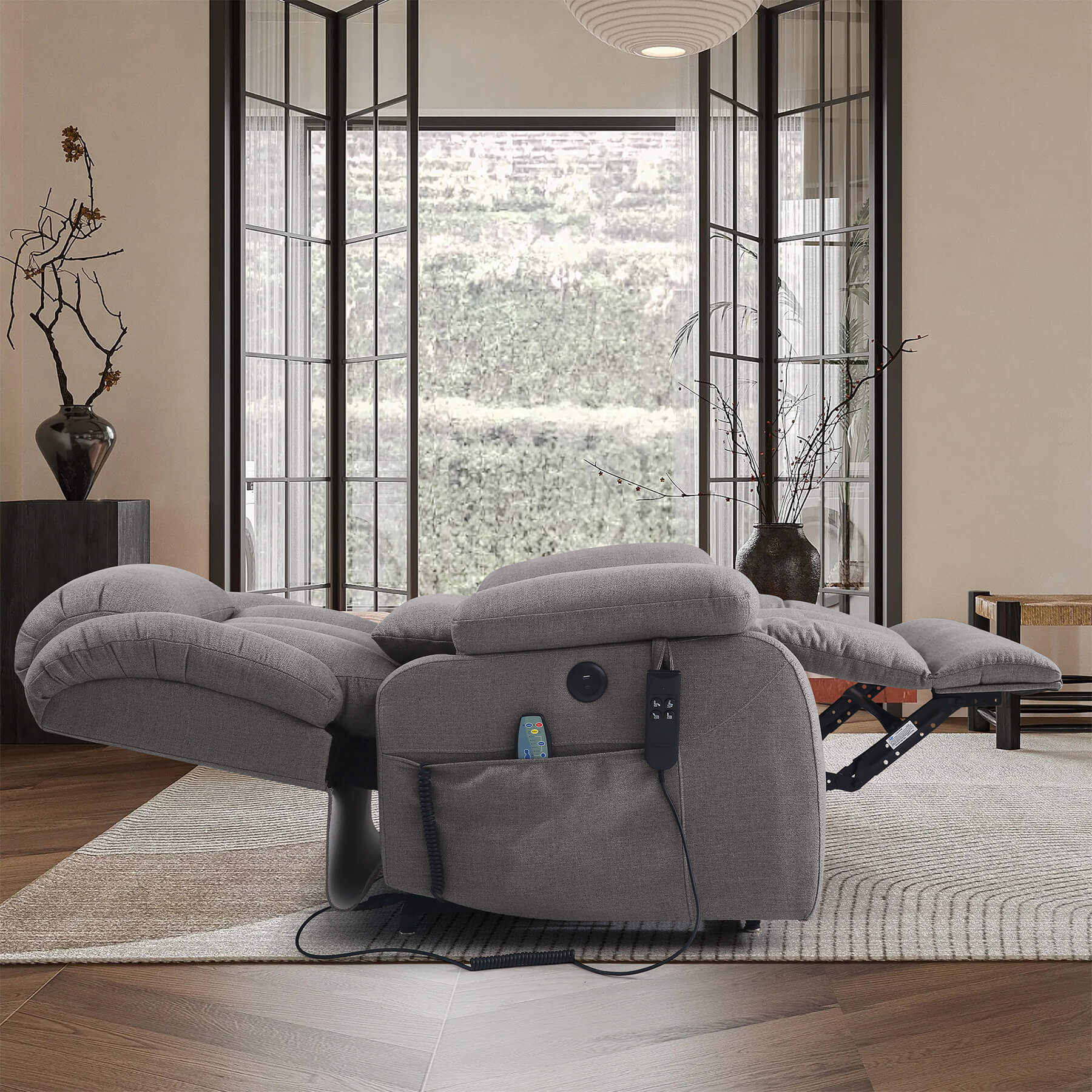 The gray lay flat recliner chair, perfect for sleeping.