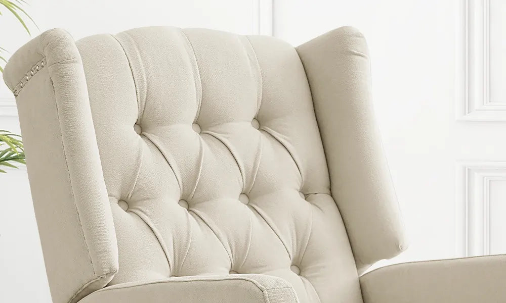 The back of the chair is shown in detail with a button tufted design.