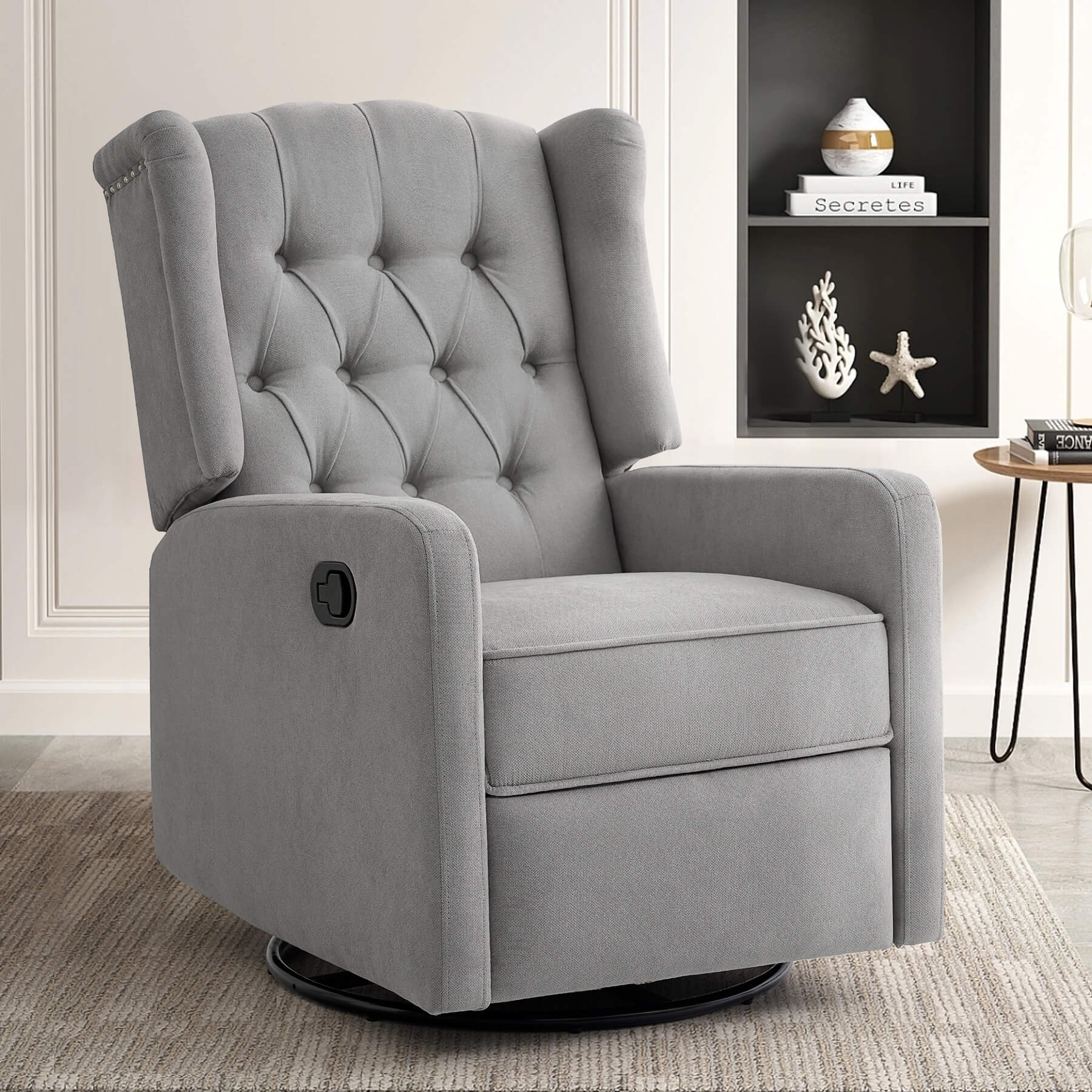 Gray fabric manual swivel rocker recliner chair in the living room.