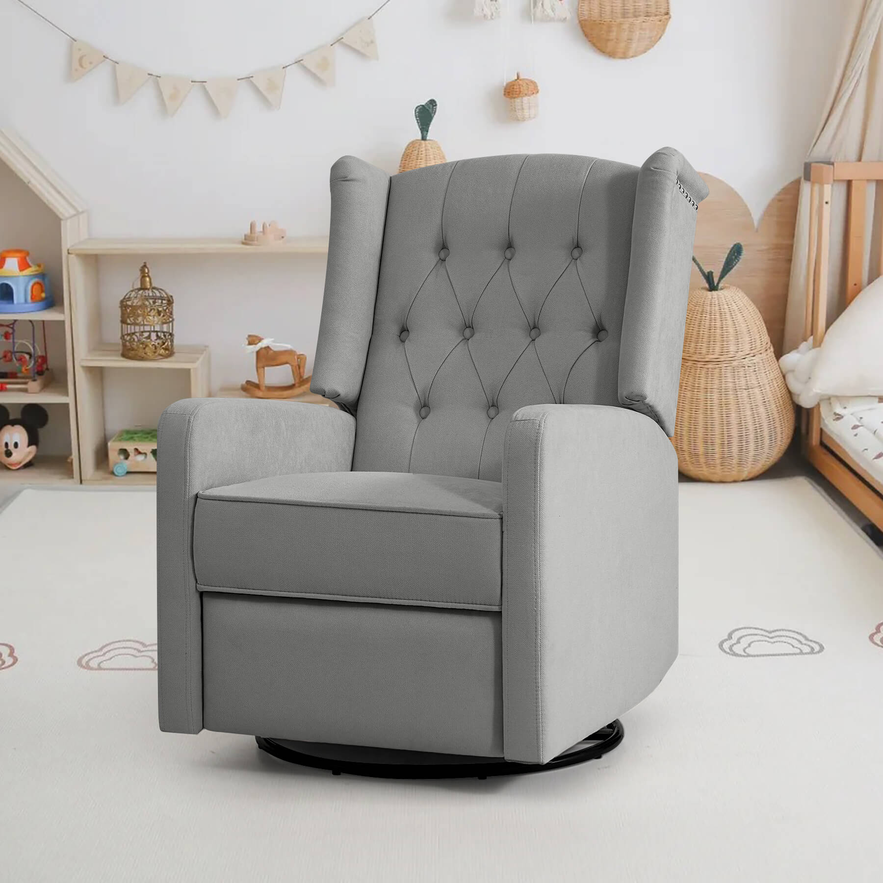 Gray fabric swivel glider rocker recliner in the nursery.
