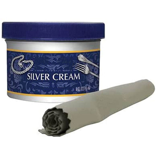 A Cleaner and Polish Cream and a cloth on a white background